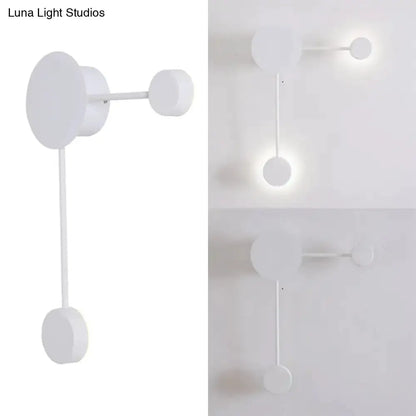 Decorbites white geometric wall sconce with circular discs and hanging rod on Tampa Home & Garden Store