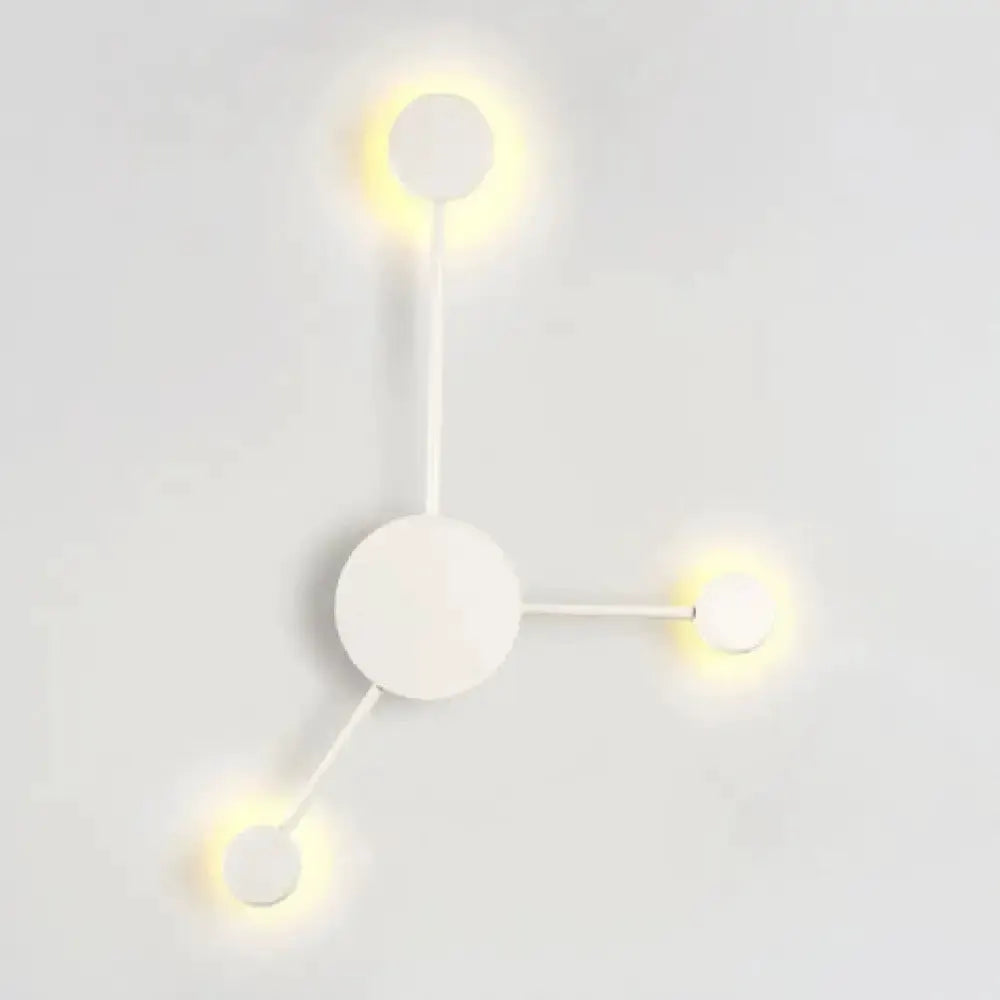 Modern white geometric wall sconce with three radiating arms by Decorbites on Tampa Home & Garden Store