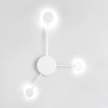 Modern white geometric wall sconce by Decorbites with three circular arms and glowing ends on Tampa Home & Garden Store