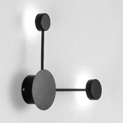 Modern black geometric wall sconce by Decorbites with circular disks on Tampa Home & Garden Store