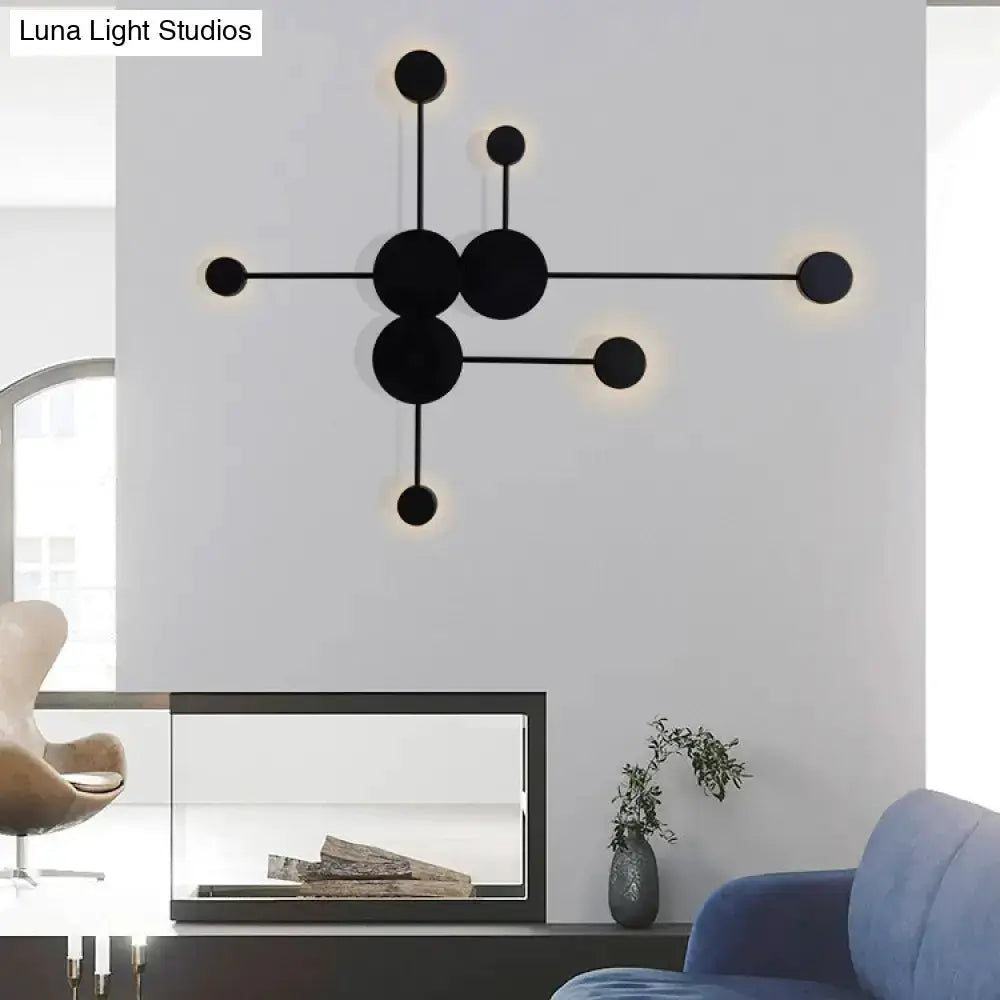 Modern black and white geometric wall sconce with connected disks, wall-mounted Decorbites on Tampa Home & Garden Store