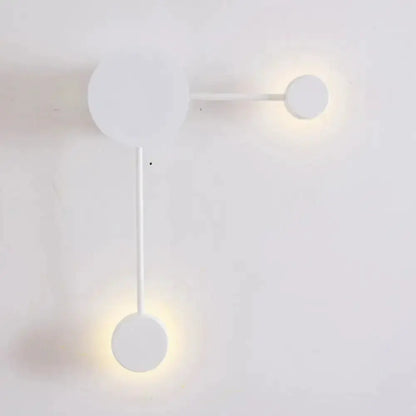 Decorbites modern white geometric wall sconce with circular light modules on Tampa Home & Garden Store
