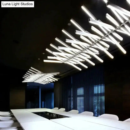 Chandelier by Decorbites, modern black and white LED pendant light over a white conference table on Tampa Home & Garden Store