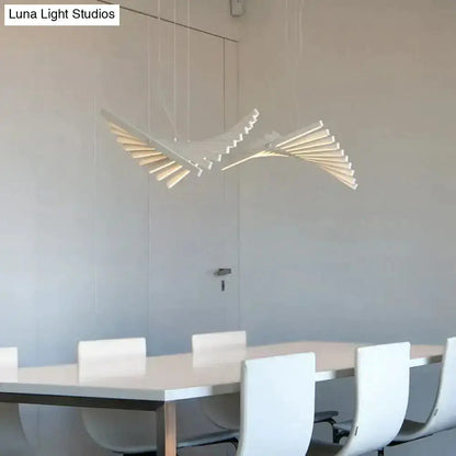 Modern black & white LED chandelier pendant light with sculptural wing blades on Tampa Home & Garden Store