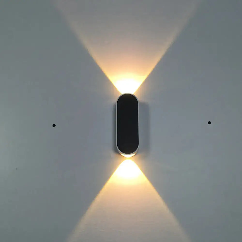 Black White Metal Oblong Wall Sconce by Decorbites with warm up and down light on Tampa Home & Garden Store