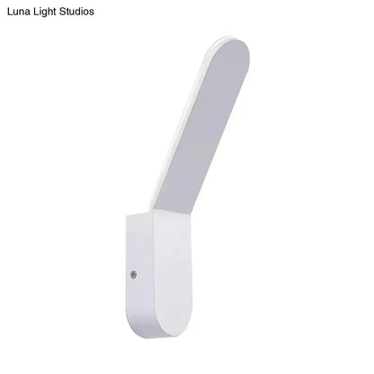 White oval metal corridor wall sconce with rounded backplate on Tampa Home & Garden Store