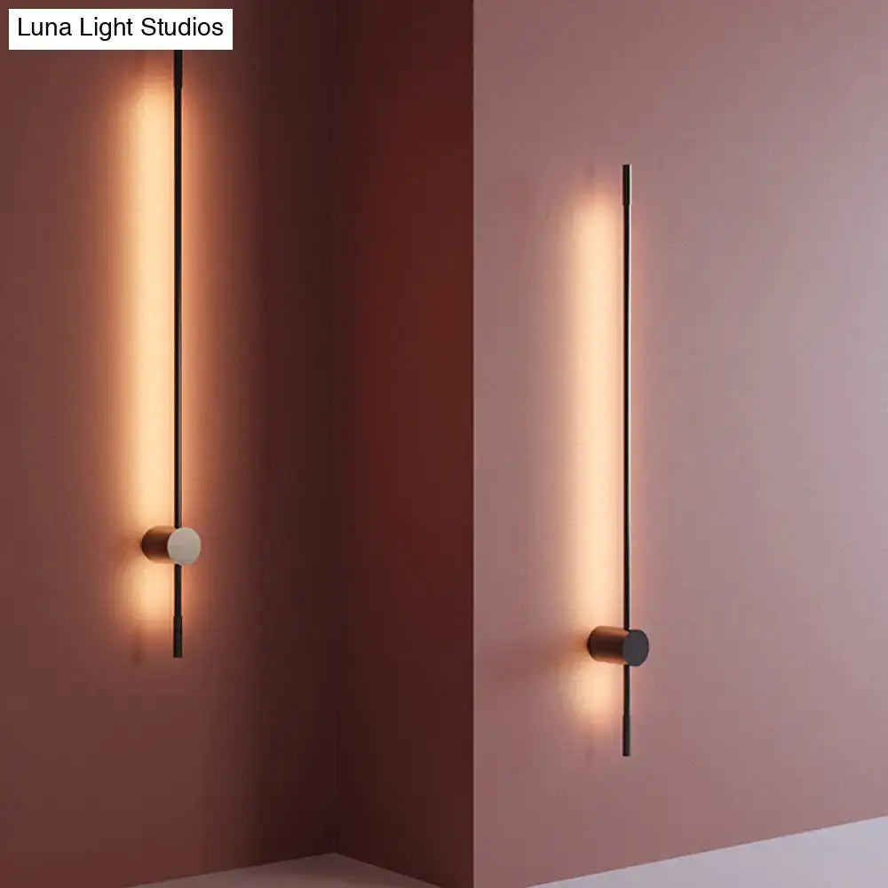 Modern black and white LED metal wall sconce with slim vertical rod Decorbites on Tampa Home & Garden Store