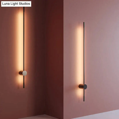 Modern black and white LED metal wall sconce with slim vertical rod Decorbites on Tampa Home & Garden Store