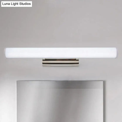 Modern white LED vanity light sconce with brass mount over bathroom mirror Decorbites on Tampa Home & Garden Store