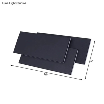 Decorbites black & white LED wall lamp with layered rectangular panels 10in long 5in high on Tampa Home & Garden Store