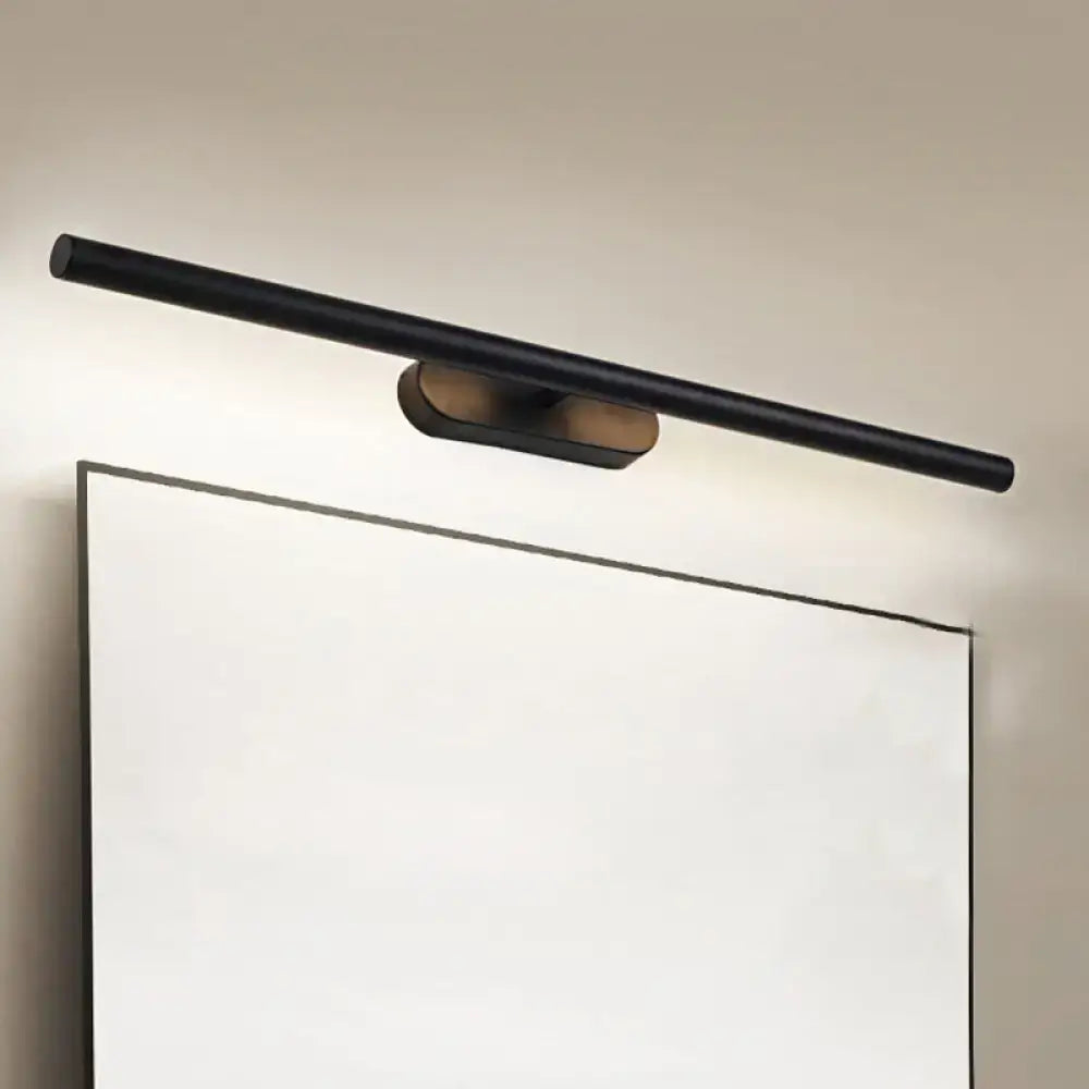 Modern black metal LED wall vanity light bar mounted above a large white bathroom mirror on Tampa Home & Garden Store