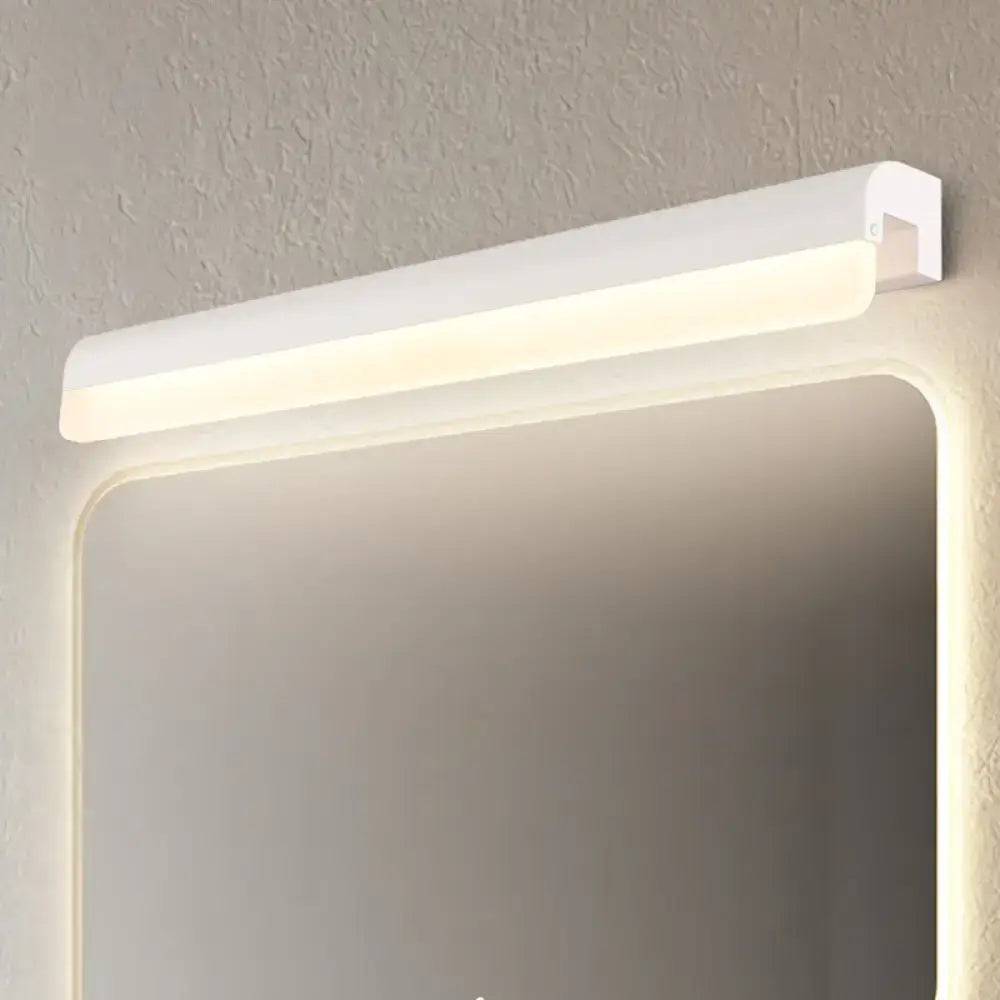 Modern black & white linear LED bathroom wall light sconce by Decorbites above mirror on Tampa Home & Garden Store