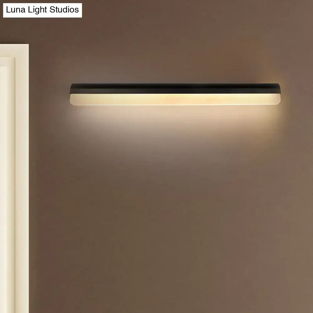 Modern black and white linear LED bathroom wall light sconce, wall-mounted with warm glow on Tampa Home & Garden Store