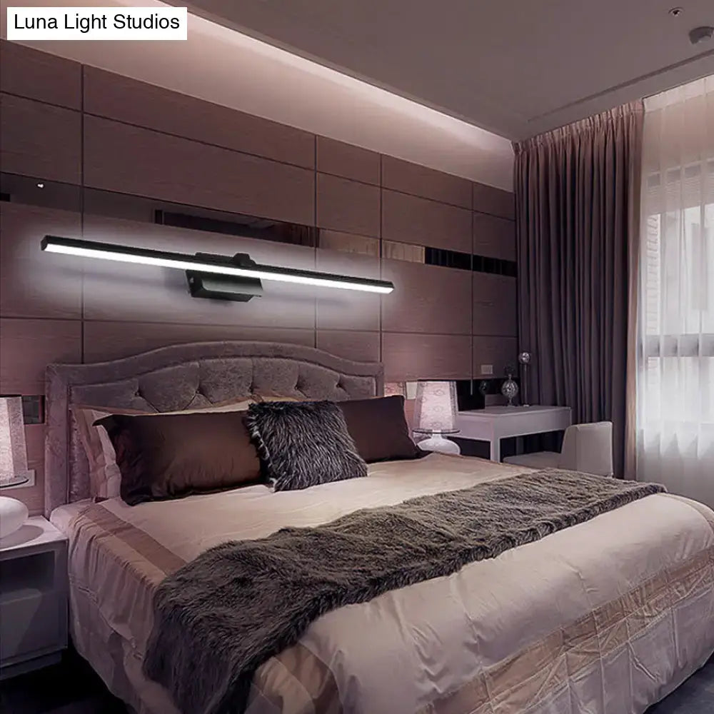 Black Iron Vanity Light by Decorbites, wall-mounted bar above a tufted headboard in a modern bedroom on Tampa Home & Garden Store