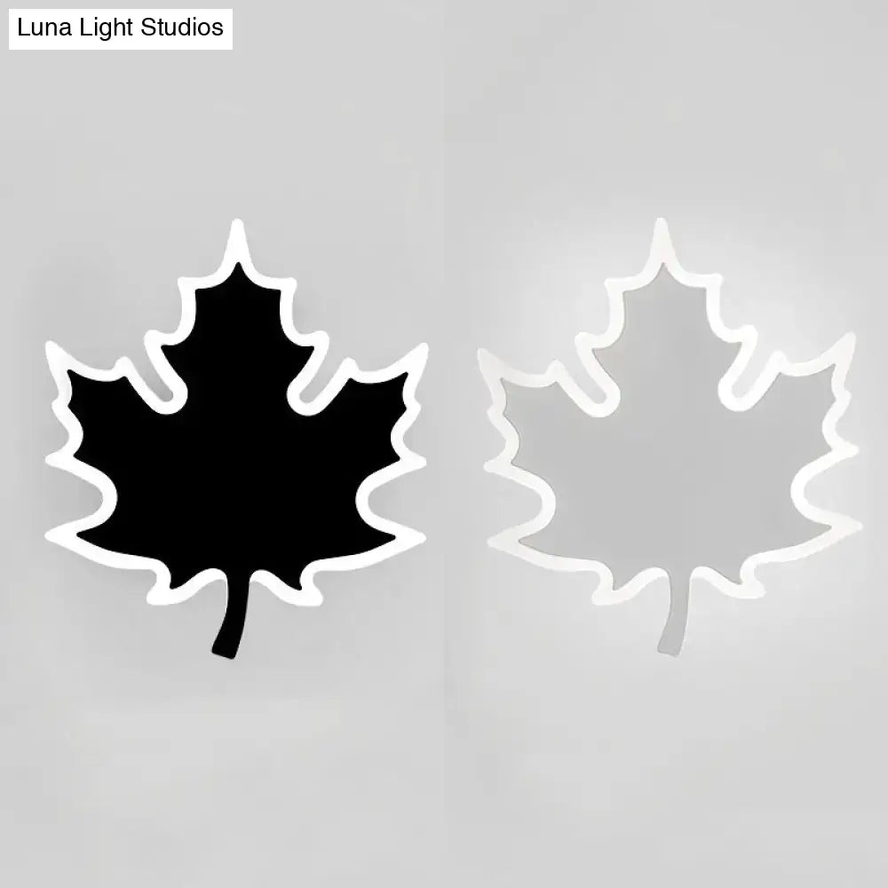 Black White Maple Leaf Sconce by Decorbites with solid left leaf and white outline right leaf on Tampa Home & Garden Store