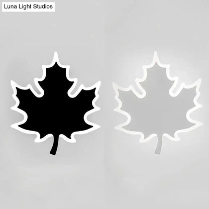 Black White Maple Leaf Sconce by Decorbites with solid left leaf and white outline right leaf on Tampa Home & Garden Store