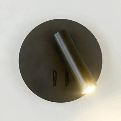 Modern black metal wall lamp sconce with circular backplate and angled LED arm Decorbites on Tampa Home & Garden Store