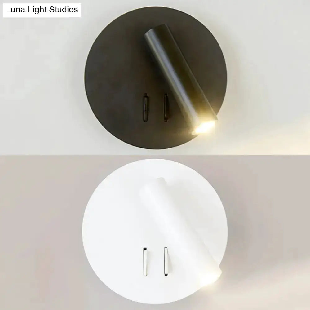 Modern black & white metal wall lamp LED sconce with circular backplate and angled light on Tampa Home & Garden Store