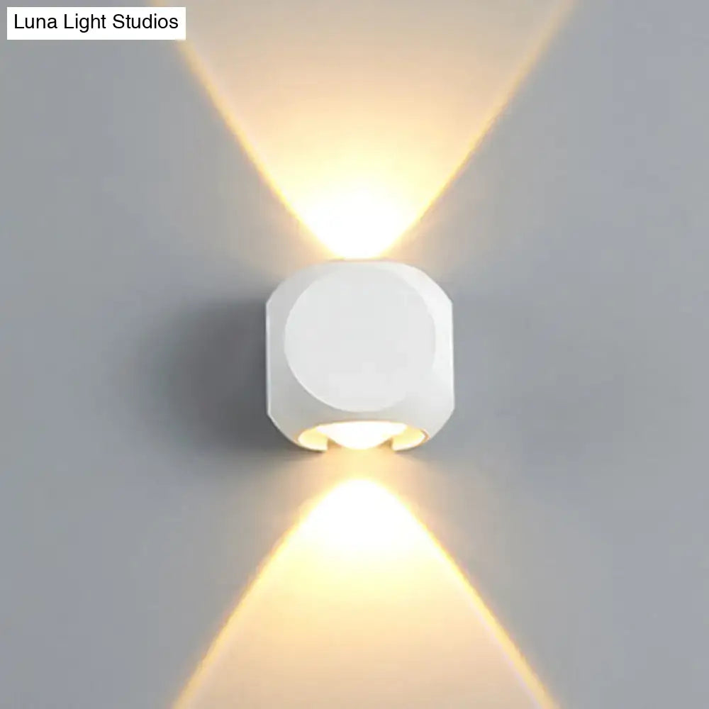 Mini Cube Wall Sconce by Decorbites, white cube wall light casting warm upward and downward glow on Tampa Home & Garden Store