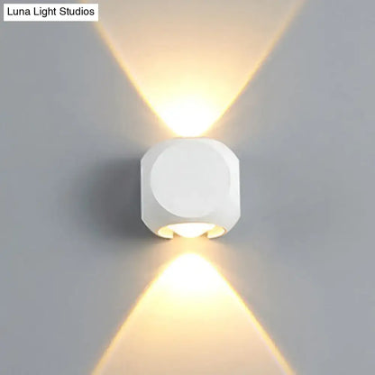 Mini Cube Wall Sconce by Decorbites, white cube wall light casting warm upward and downward glow on Tampa Home & Garden Store