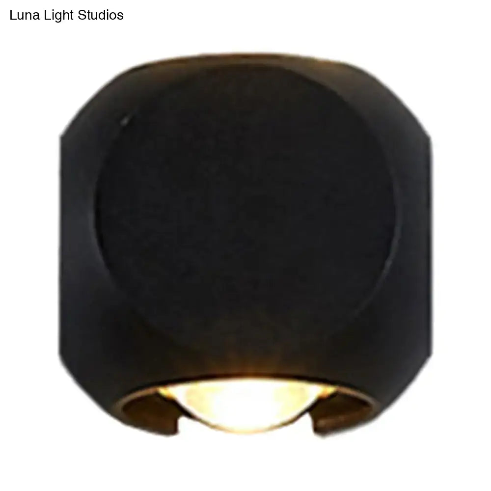 Decorbites Mini Cube Wall Sconce in black cube design with warm downward light on Tampa Home & Garden Store