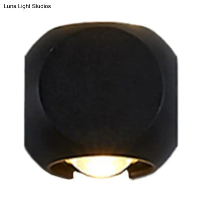 Decorbites Mini Cube Wall Sconce in black cube design with warm downward light on Tampa Home & Garden Store