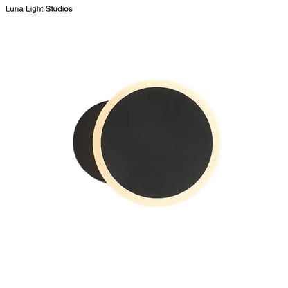 Black White LED Sconce Decorbites round black disk with warm halo glow on Tampa Home & Garden Store
