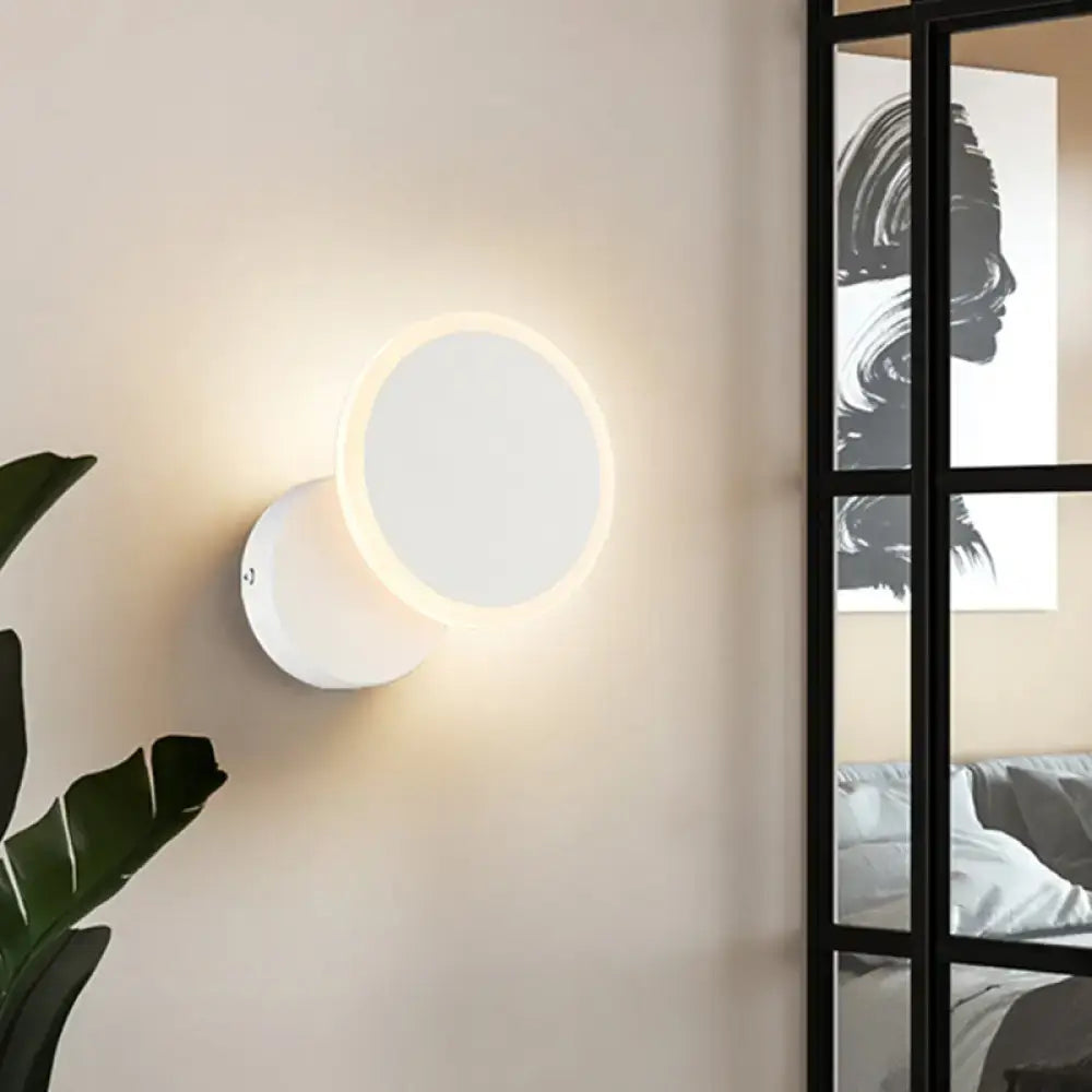 Black White LED Sconce with round disc and halo glow, wall-mounted white finish on Tampa Home & Garden Store