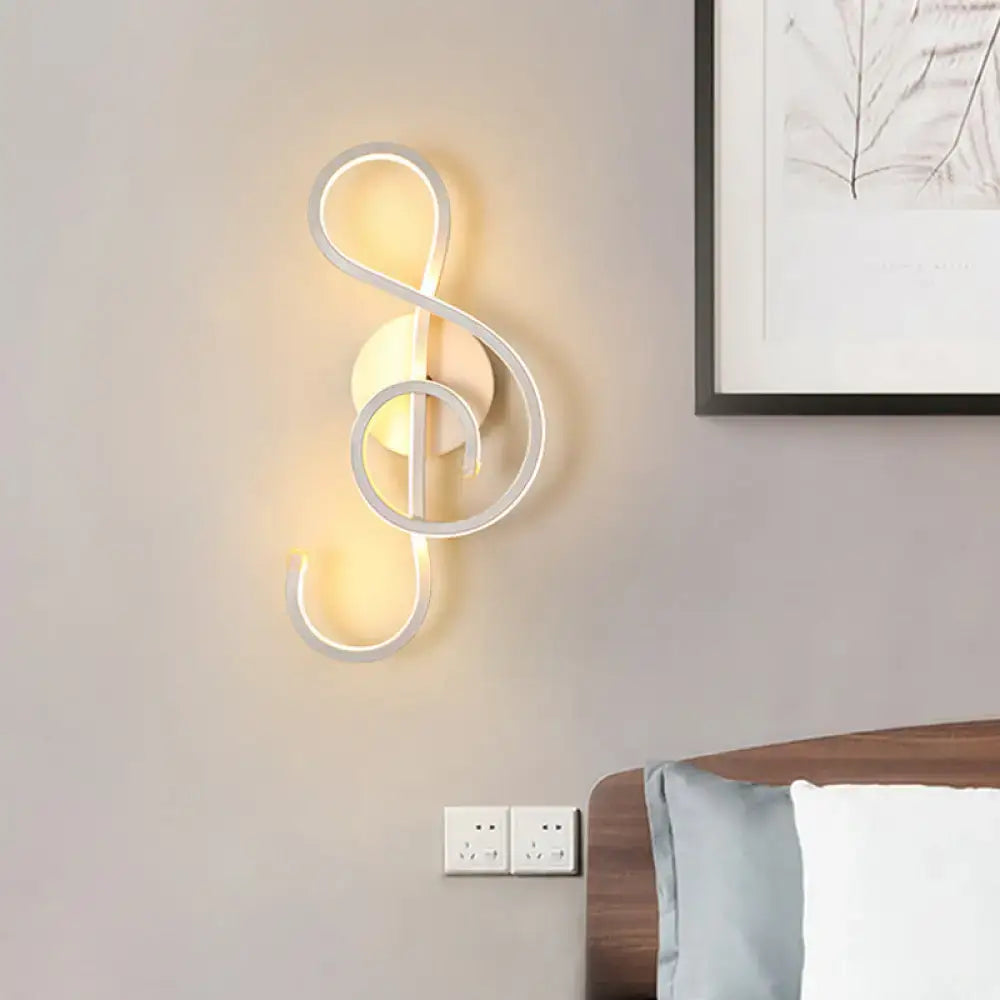 White musical note lamp, Decorbites wall sconce with warm LED glow on Tampa Home & Garden Store