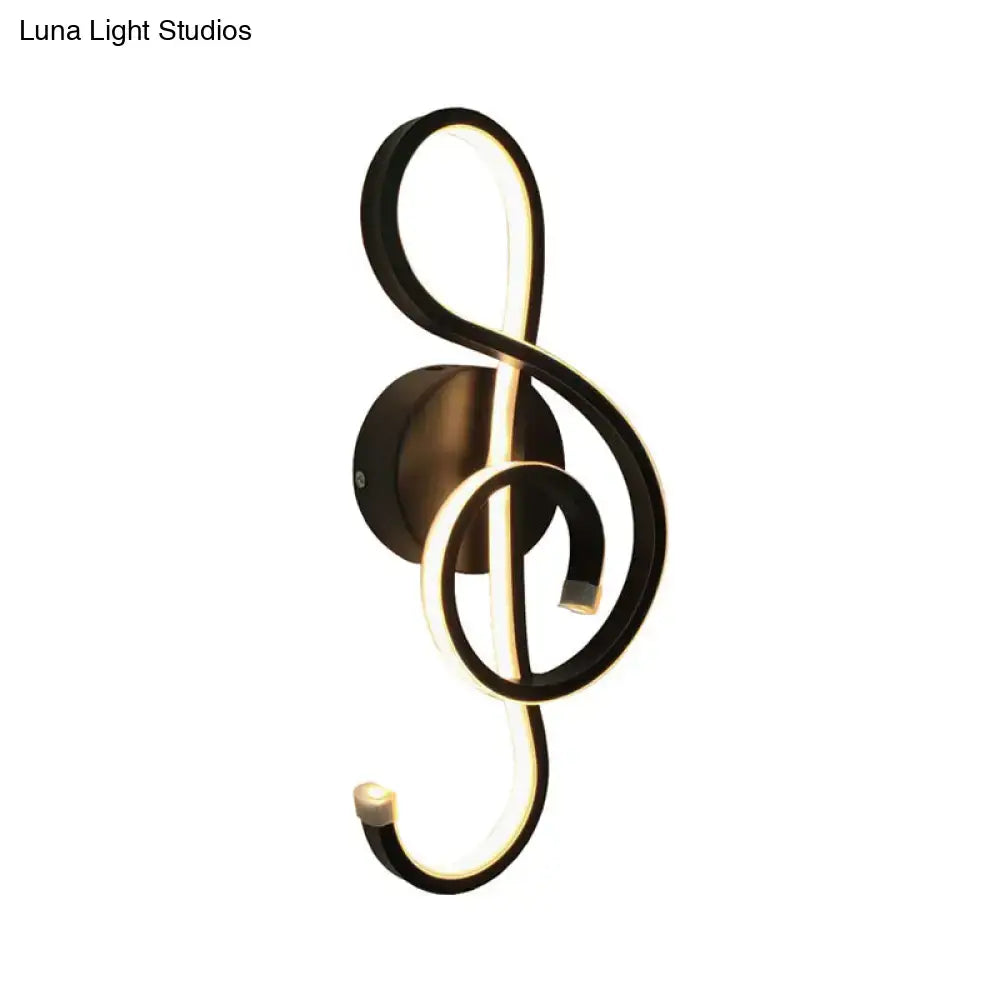 White musical note wall lamp with black metal frame and warm LED light by Decorbites on Tampa Home & Garden Store