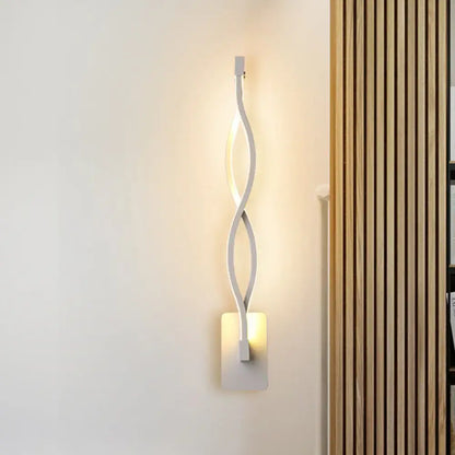 White musical note wall lamp with intertwined curved arms and warm LED glow Decorbites on Tampa Home & Garden Store