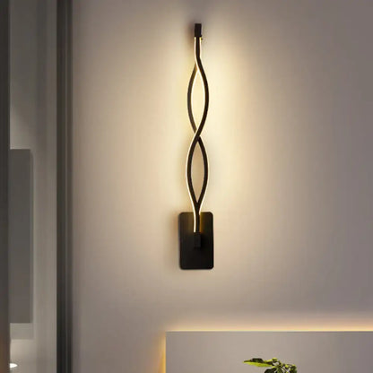 White musical note wall lamp with intertwined loops, warm LED glow, wall-mounted decor on Tampa Home & Garden Store