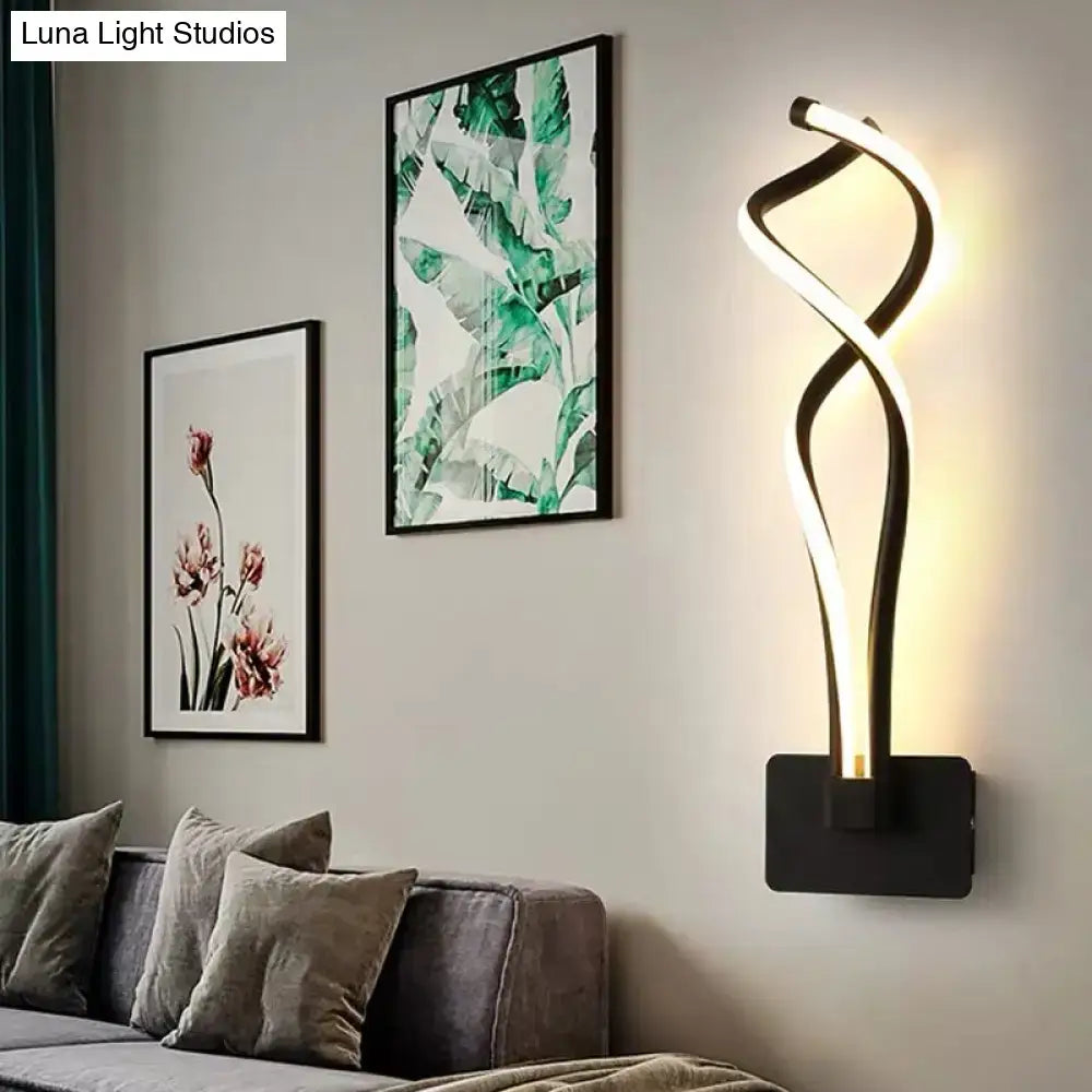 White musical note lamp wall sconce with curved black base and warm LED glow on Tampa Home & Garden Store