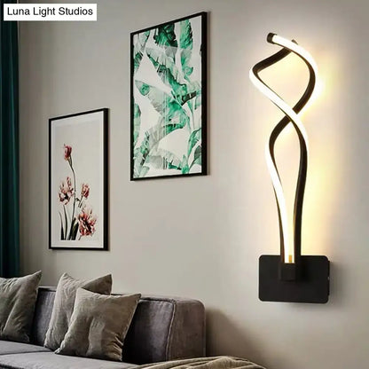 White musical note lamp wall sconce with curved black base and warm LED glow on Tampa Home & Garden Store