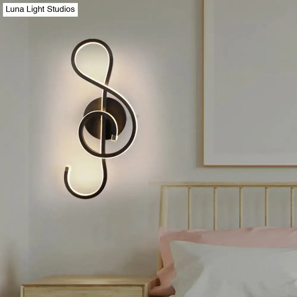 White treble-clef musical note lamp wall sconce with warm LED glow, Decorbites on Tampa Home & Garden Store