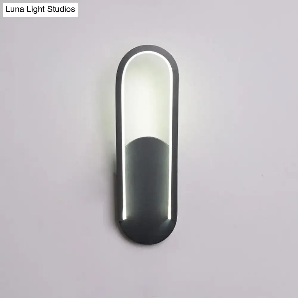 Black metal parlor wall sconce with acrylic panel and vertical LED edge lighting on Tampa Home & Garden Store