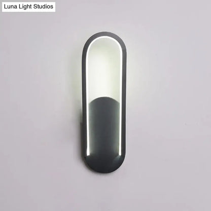 Black metal parlor wall sconce with acrylic panel and vertical LED edge lighting on Tampa Home & Garden Store