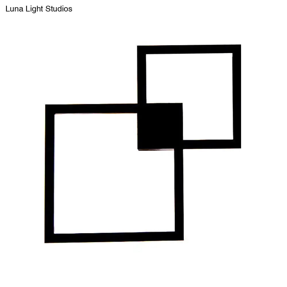 White overlapping square acrylic sconce with intersecting frames on Tampa Home & Garden Store