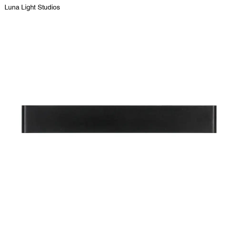 Black rectangular wall lamp made of metal for modern decor on Tampa Home & Garden Store