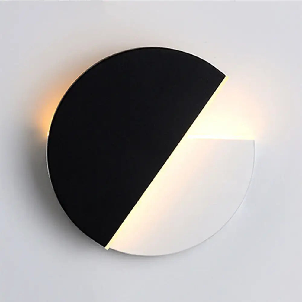 Black acrylic minimalist LED wall lamp circular two-tone wall light with diagonal glowing edge on Tampa Home & Garden Store