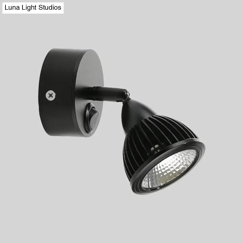 Decorbites black LED wall spotlight with adjustable head and ribbed heatsink on wall mount on Tampa Home & Garden Store