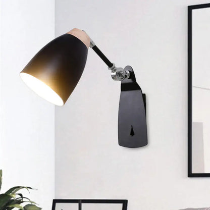 Black cup-shaped wall light with beige cap and adjustable arm on Tampa Home & Garden Store