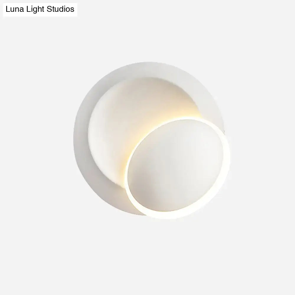 White Eclipse Wall Lamp by Decorbites, white circular overlapping discs with a warm glow on Tampa Home & Garden Store