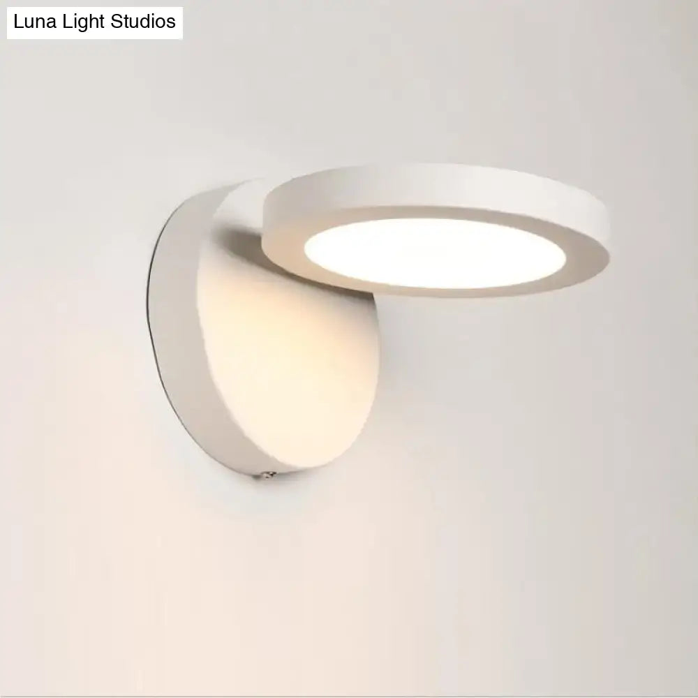 Decorbites Acrylic Rotating Wall Light with white circular ring design on wall on Tampa Home & Garden Store