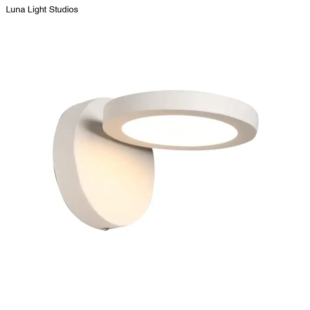 Acrylic rotating wall light by Decorbites with white circular ring and wall mount on Tampa Home & Garden Store