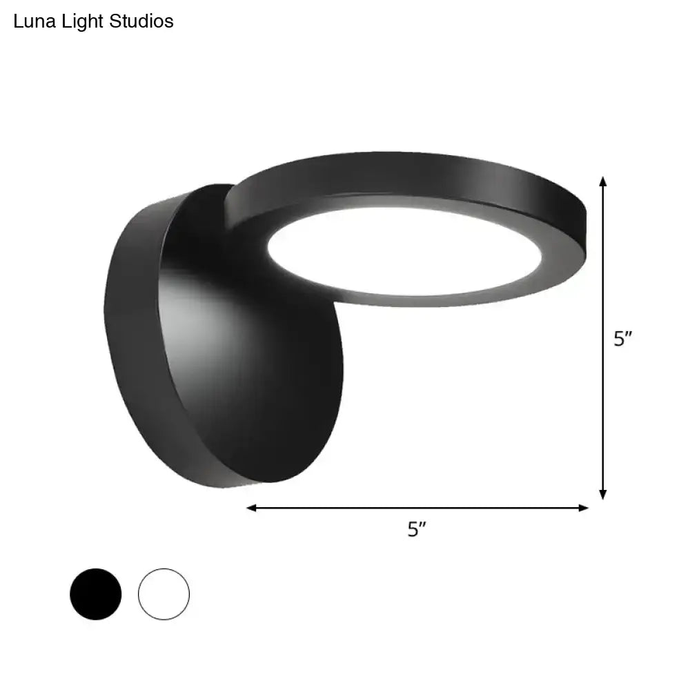 Acrylic rotating wall light by Decorbites in black with circular ring, wall-mount 5-inch diameter on Tampa Home & Garden Store