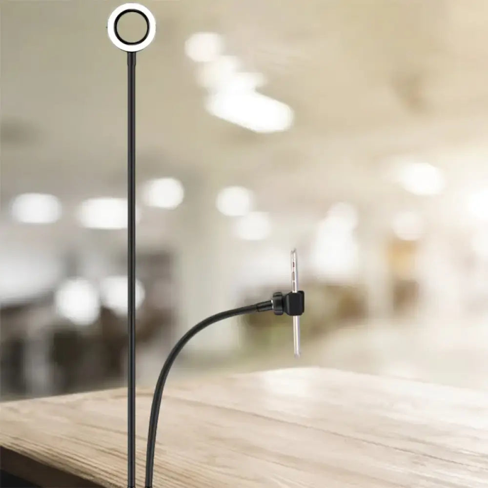 Black USB Mirror Lamp with circular ring light on a slim black stand and a phone clip on Tampa Home & Garden Store