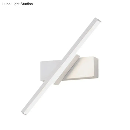 White slim LED wall sconce with diagonal bar and rectangular backplate on Tampa Home & Garden Store