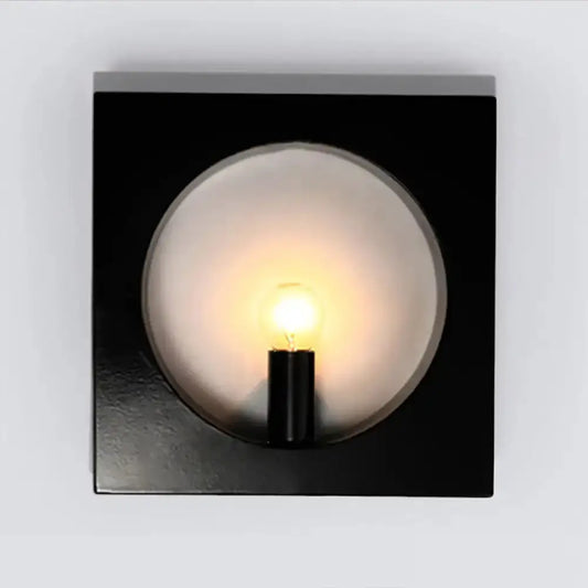 Modern black square wall lamp with glass globe by Decorbites on Tampa Home & Garden Store