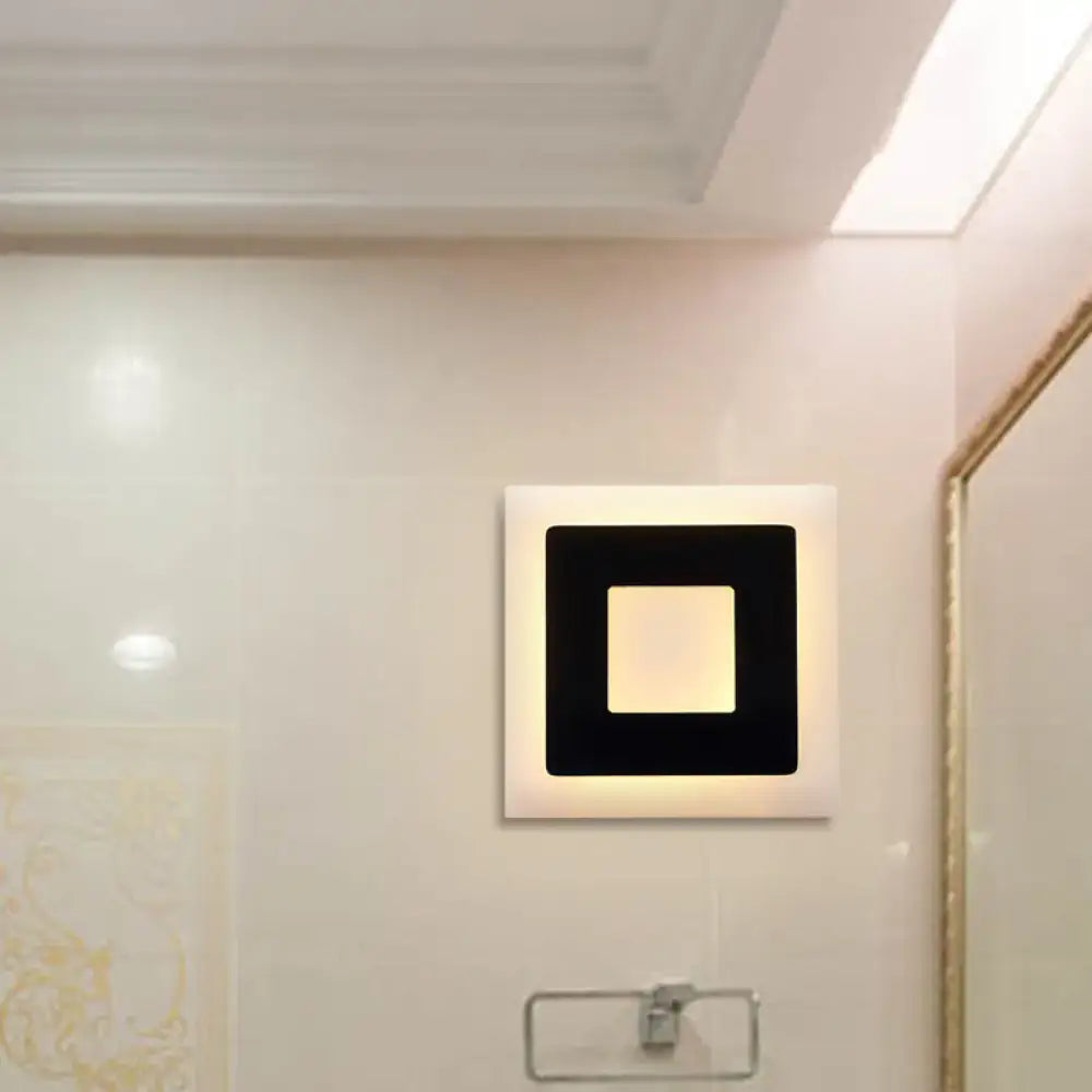 Acrylic square wall sconce with white outer frame and black inner square glow on Tampa Home & Garden Store